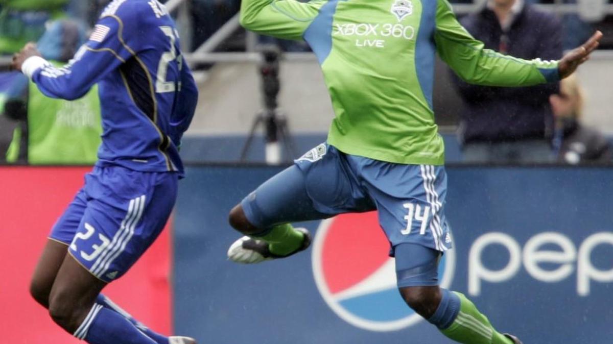 Kei Kamara, shown at left in a 2010 MLS match in Seattle, was voted MLS Humanitarian of the Year for 2015.