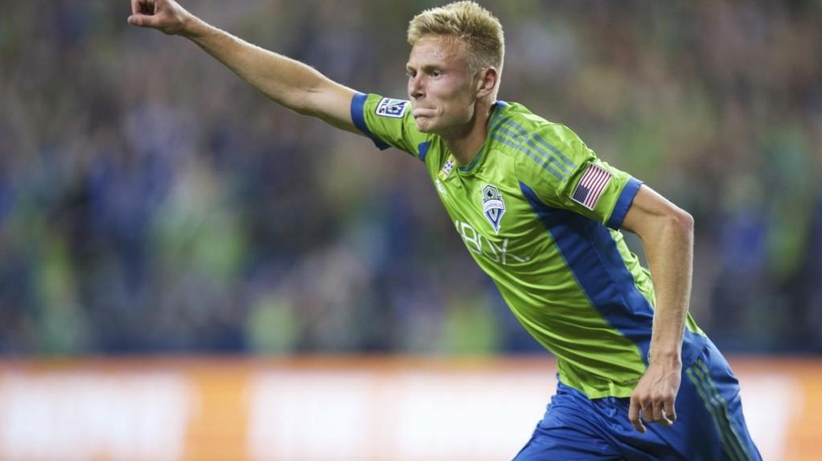 Seattle Sounders' Andy Rose celebrates scoring against Real Salt Lake during a 2014 MLS match.
