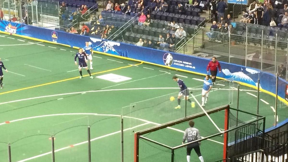 Tacoma Stars -- in dark blue but no argyle -- in opening minutes of Friday match with the Cedar Rapids Rampage.
