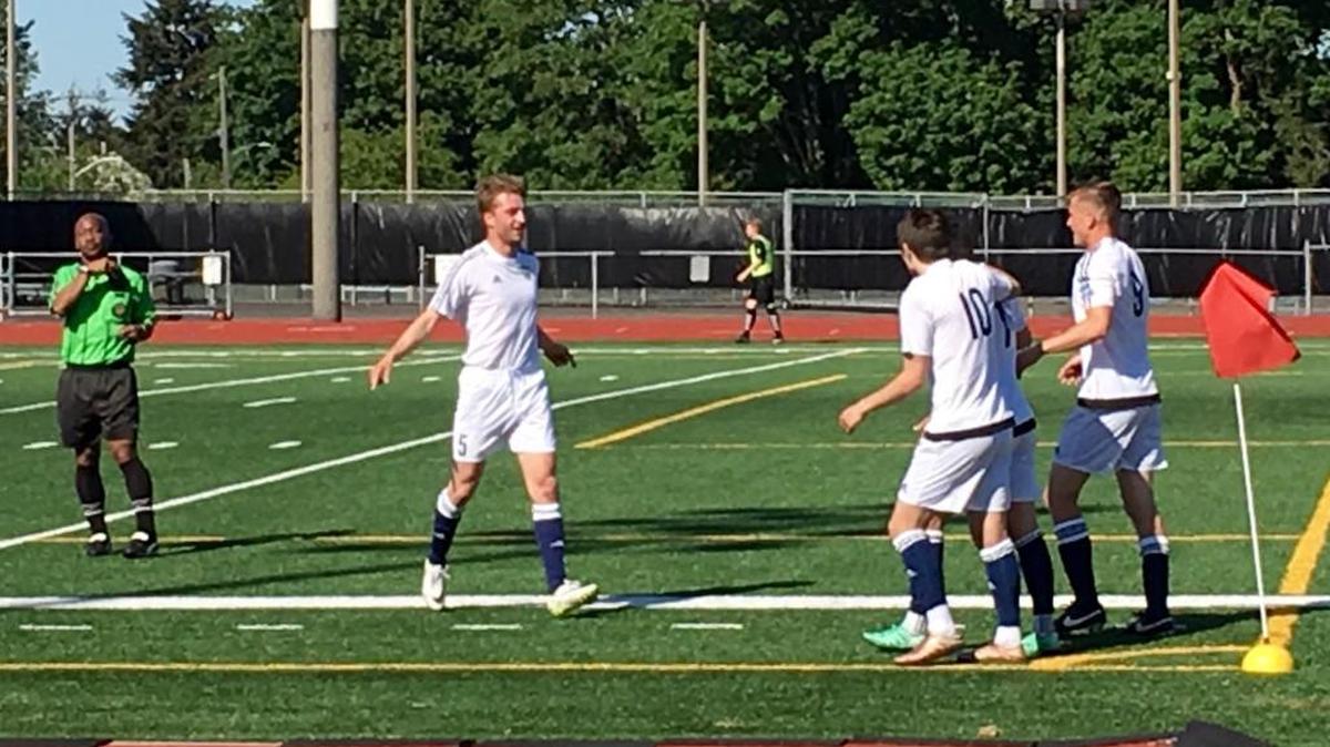 South Sound Shock FC celebrates its first goal of the season Sunday at Harry Lang Stadium in Lakewood.