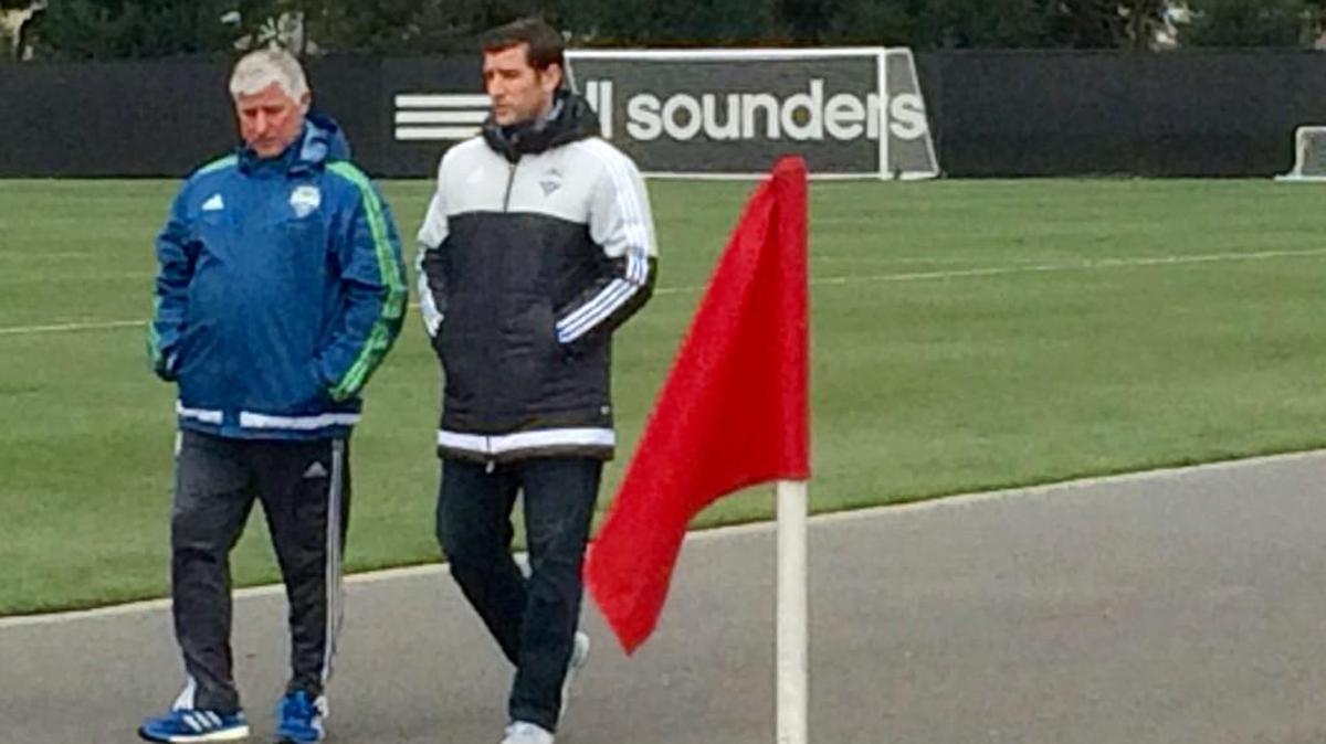 Sounders coach Sigi Schmid and son/assistant Kurt Schmid depart Starfire training field on Friday.