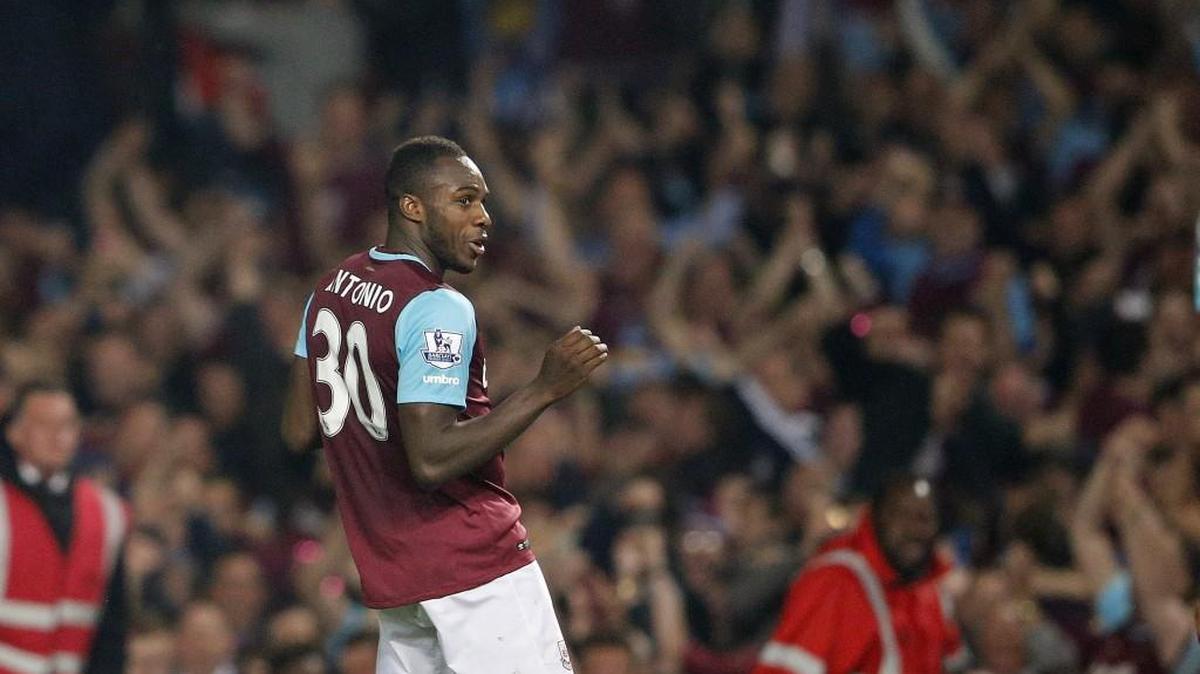 West Ham's Michail Antonio celebrates after scoring against Manchester United during the English Premier League match at Boleyn Ground stadium in London.