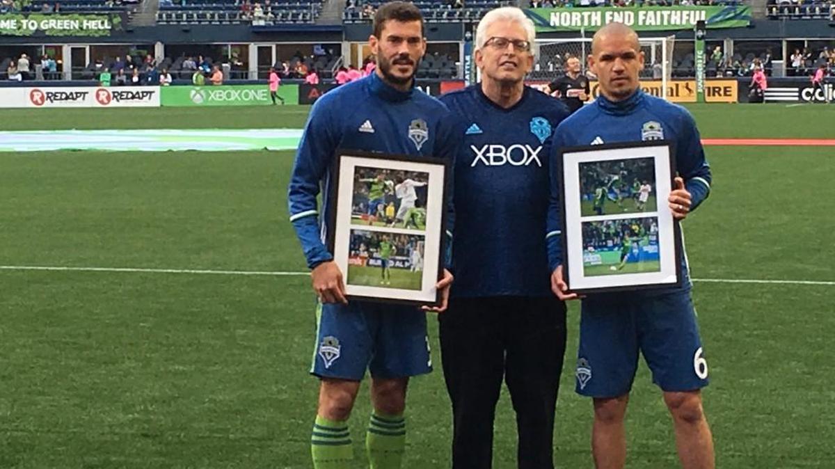 Owner Joe Roth with Sounders Brad Evans (left) and Osvaldo Alonso, each making their 200th MLS appearance tonight.
