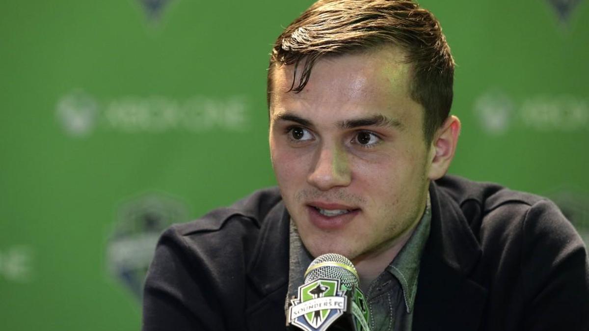 Jordan Morris speaks Thursday, Jan. 21, 2016, in Seattle after the MLS soccer Seattle Sounders FC announced his signing as a forward. Morris, who played for Stanford, was the Hermann Trophy winner in 2015 as the top college player in the country.