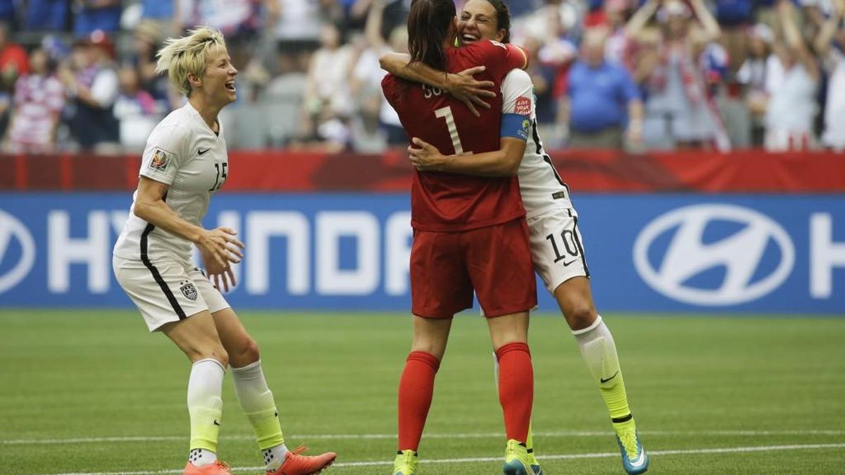 United States women’s player of the year nominees Megan Rapinoe, Hope Solo and Carli Lloyd (from left) after Lloyd scored her third goal against Japan during the FIFA Women's World Cup soccer final in Vancouver, B.C.
