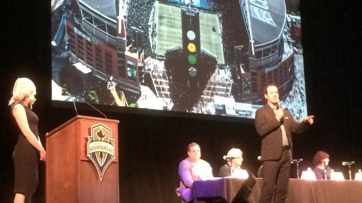 Sounders FC chief operating officer Bart Wiley addresses Alliance meeting Thursday at Paramount Theatre.
