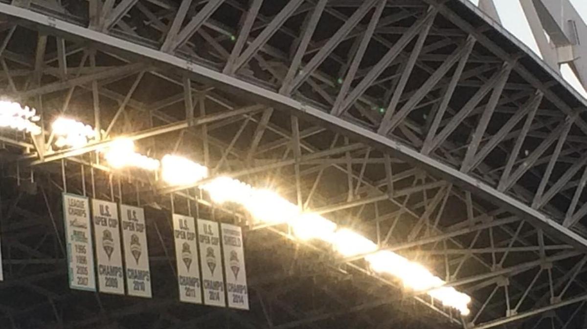 
The Sounders unveiled their 2014 Supporters’ Shield banner (far right) before match with Galaxy.
