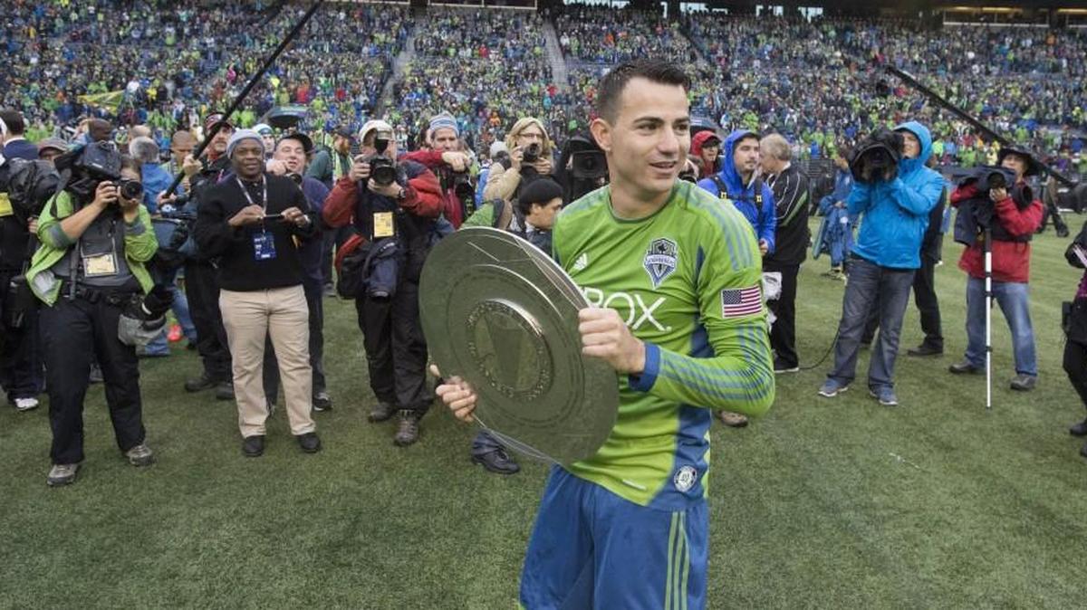 
Marco Pappa of Guatemala and the Sounders holds the MLS Supporter's Sheild after Seattle secured the best regular season record last season.
