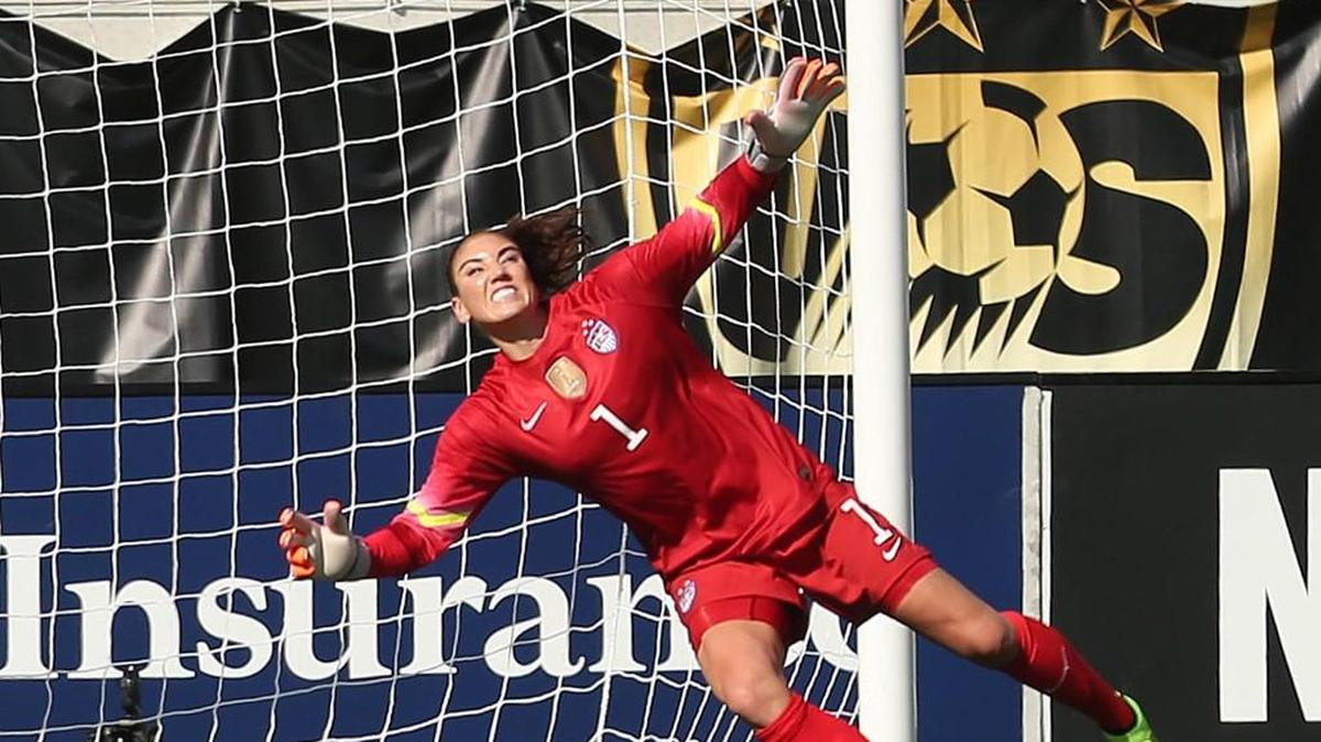 USA goalkeeper Hope Solo makes a save during their exhibition game against Brazil last year at the Orlando Citrus Bowl in Orlando, Fla.