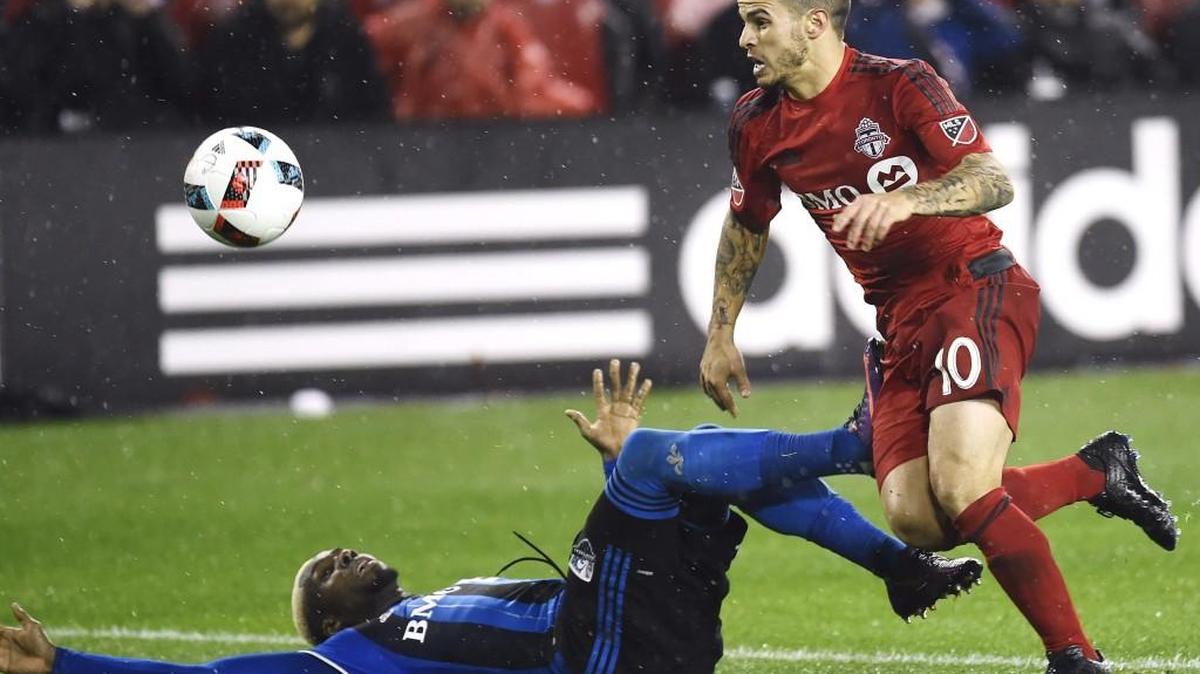 Toronto FC forward Sebastian Giovinco (10) gets past Montreal Impact defender Ambroise Oyongo during the second half of the second leg of MLS Eastern Conference championship on Nov. 30. Giovinco leads Toronto against Seattle in the MLS Cup on Saturday.