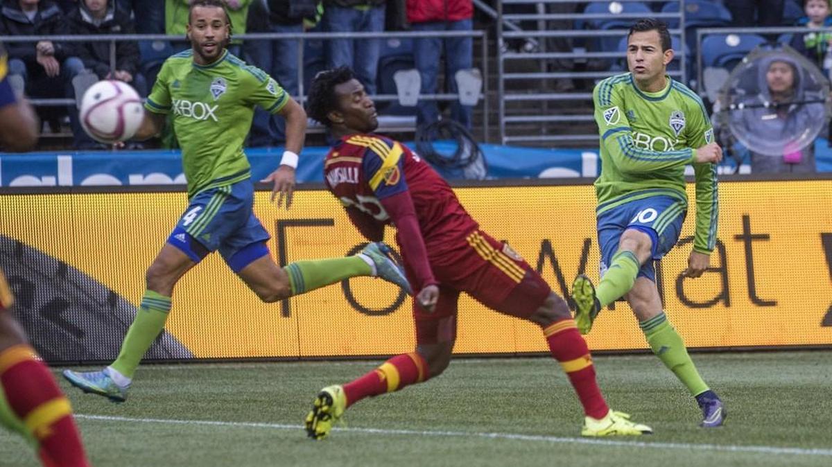 The Sounders’ Marco Pappa, right, scores on a long kick during the first half of Seattle’s 3-0 win over Real Salt Lake in the regular season finale Oct. 25.