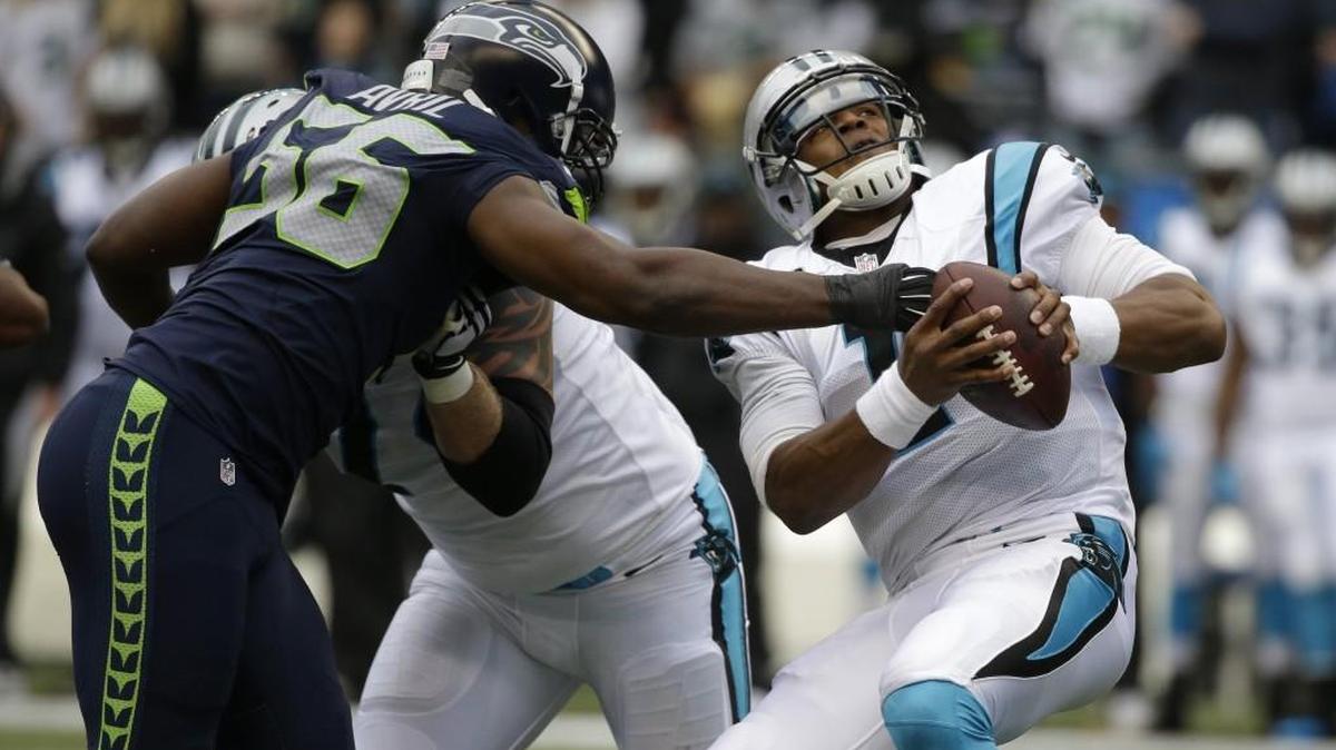 Seattle defensive end Cliff Avril (56), pressuring Carolina QB Cam Newton, believes the Seahawks will be fine if every player puts forth the proper effort and preparation.