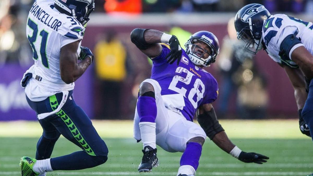Minnesota Vikings running back Adrian Peterson (28) fumbles the ball, which is recovered by the Seattle Seahawks during the fourth quarter.