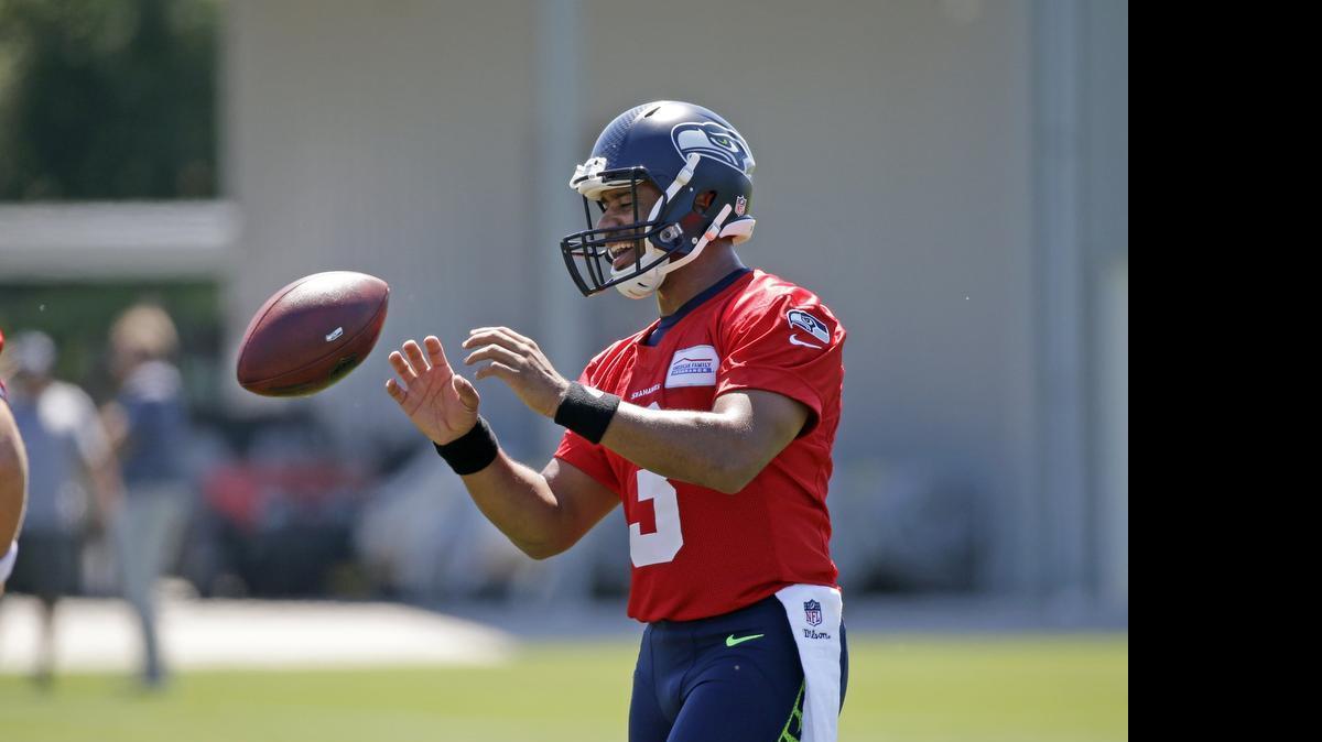 
All eyes will be on quarterback Russell Wilson and his contract as the Seahawks open training camp Friday.
