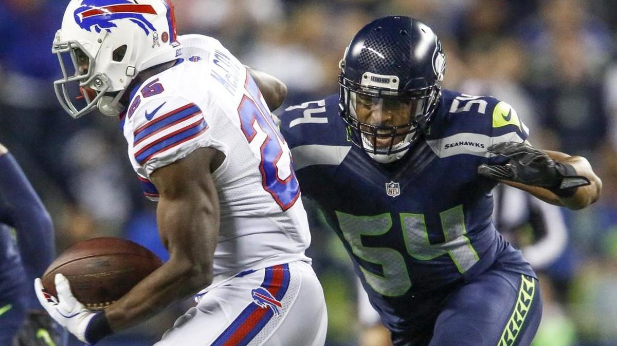 Seahawks linebacker Bobby Wagner (54) runs in to tackle Bills running back LeSean McCoy (25) in the first quarter. The Seattle Seahawks played the Buffalo Bills in a NFL game at CenturyLink Field in Seattle, Wash., on Monday, November 7, 2016.