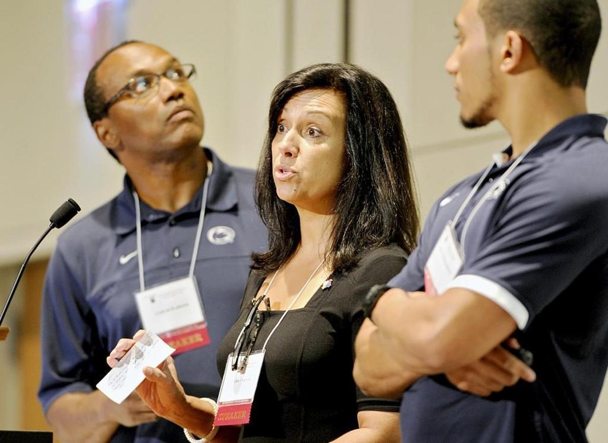 Ana Warner, wife of former Seahawks running back Curt Warner, shares stories and motivation with other parents during the closing keynote address at the National Autism Conference in State College, Pa.