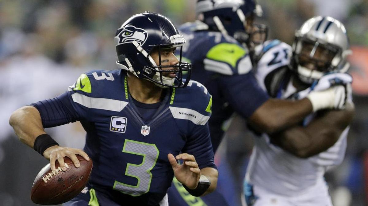Russell Wilson put up unparalleled NFL numbers this season, throwing for 4,000 yards and 30 touchdowns, and rushing for 500 yards.
