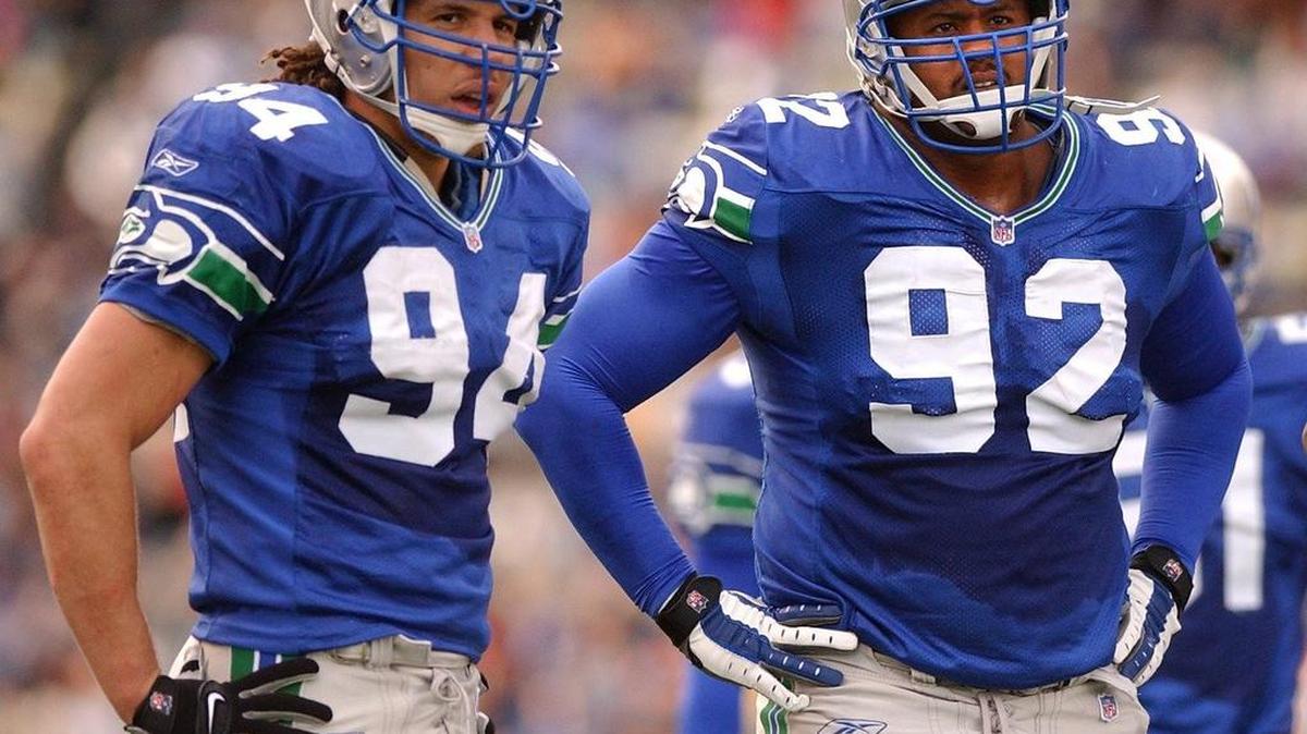 
Seahawks linebacker Chad Brown (94) and defensive end Lamar King (92) line up during a game against the Miami Dolphins at Husky Stadium in 2001. Brown was a three-time Pro Bowler during 15 seasons in the NFL, playing eight years with the Seahawks.
