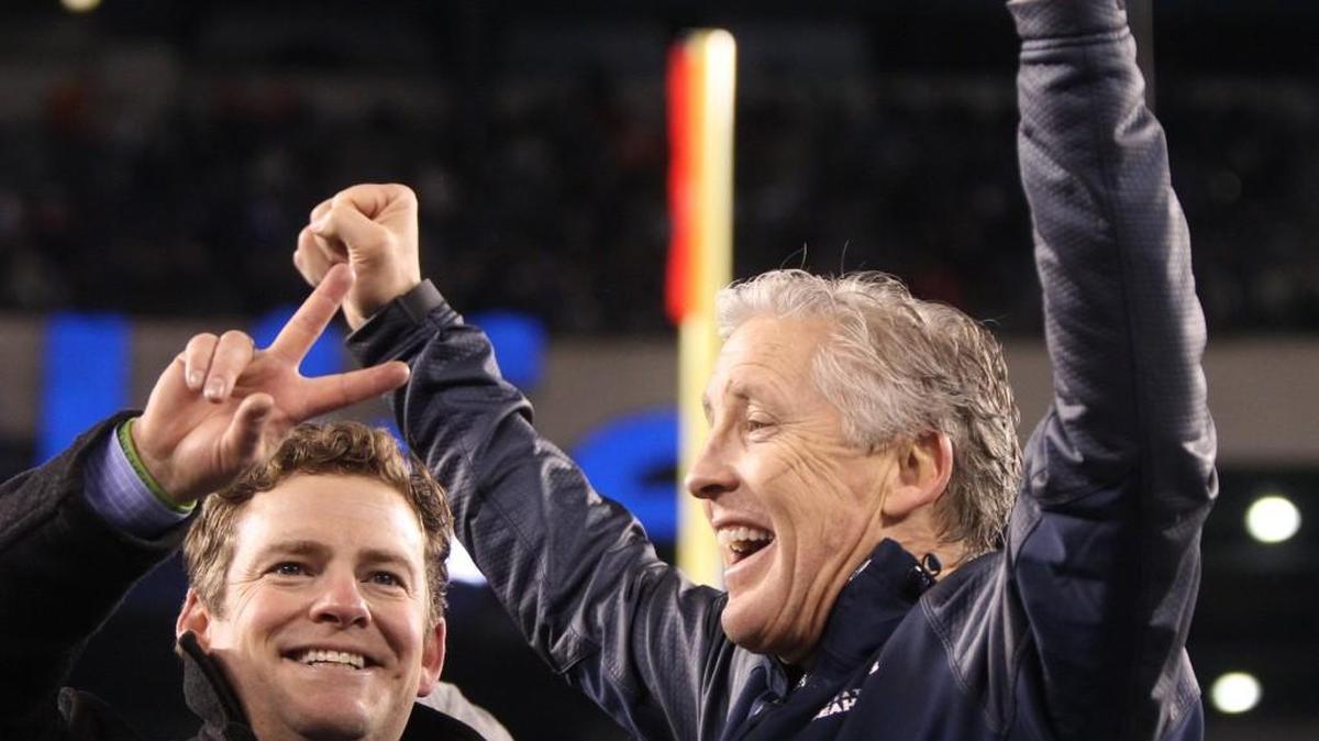 Seahawks general manager John Schneider (left) and head coach Pete Carroll celebrate following the Seahawks’ 43-8 victory over the Denver Broncos in Super Bowl XLVII in 2014. Schneider and Carroll are entering the final year of their contracts.