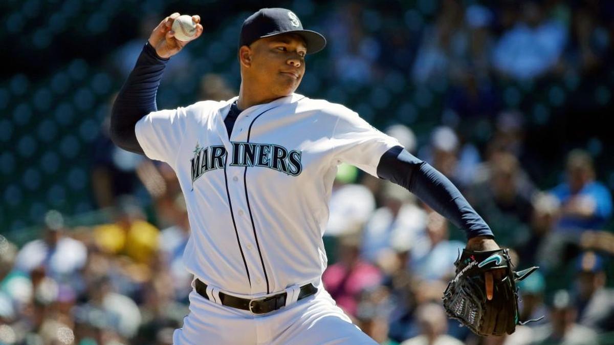Seattle Mariners starting pitcher Taijuan Walker throws against the Tampa Bay Rays in the first inning Wednesday. Walker threw five shutout innings before allowing a grand slam.