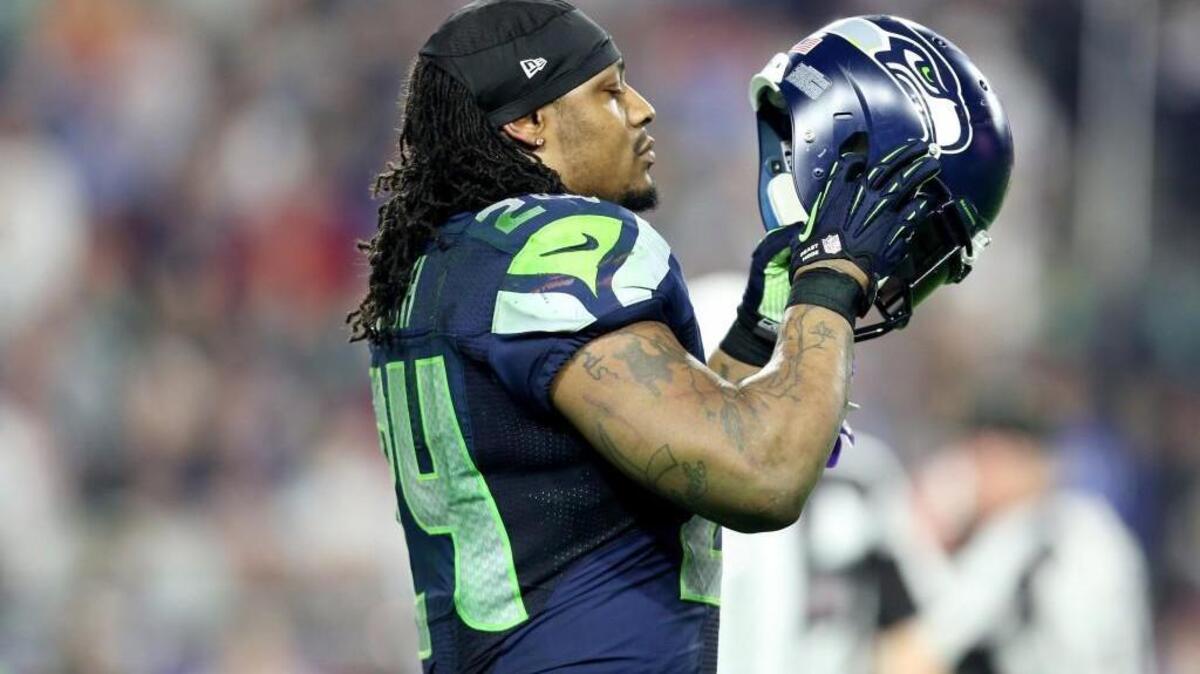 Seahawks Marshawn Lynch adjusts his helmet during Seattle’s 28-24 loss to the New England Patriots on Feb. 1, 2015 in Glendale, Arizona.