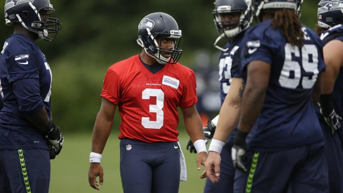 Seattle Seahawks quarterback Russell Wilson (3) takes part in NFL football practice, Thursday, June 9, 2016, in Renton.