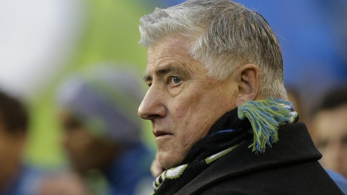Seattle Sounders head coach Sigi Schmid stands with his team before an MLS soccer match against the New England Revolution on March 8, 2015, in Seattle. It was announced Tuesday that Schmid will no longer be the Sounders' coach.