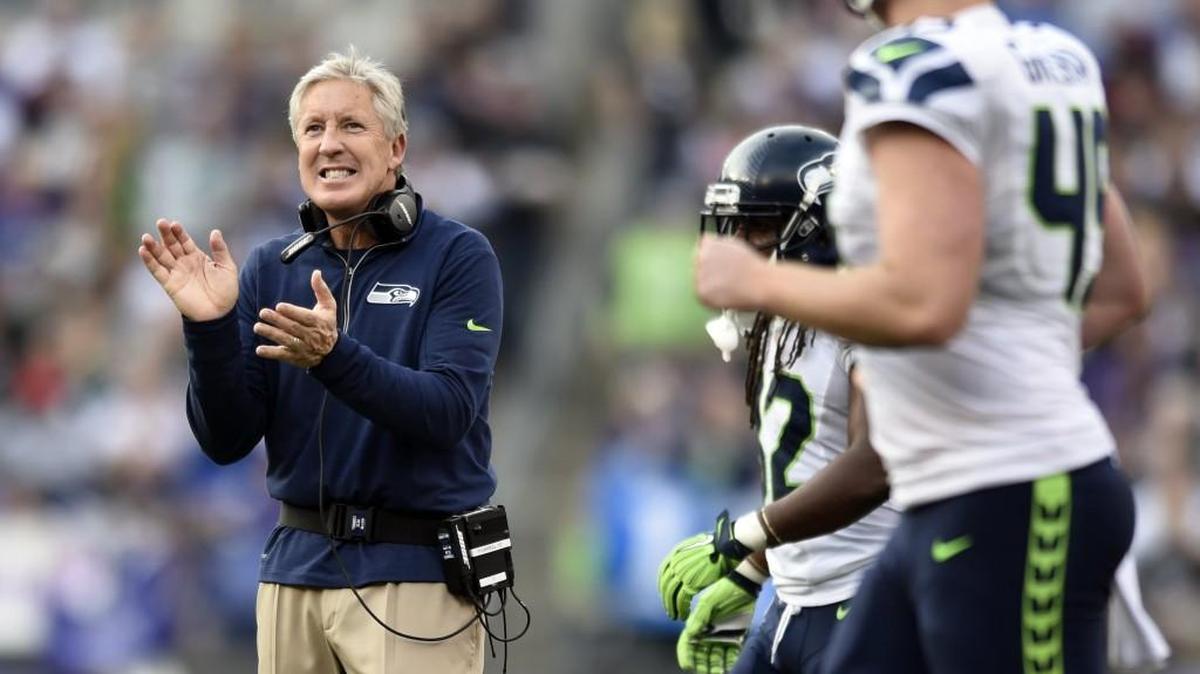 Seattle Seahawks head coach Pete Carroll encourages his team during the second half an NFL football game against the Baltimore Ravens, Sunday, Dec. 13, 2015, in Baltimore.