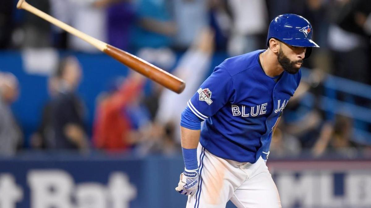 
Toronto’s Jose Bautista flips his bat after hitting a three-run home run Wednesday during the seventh inning to put the Blue Jays up 6-3 in Game 5 of the American League Division Series. 
