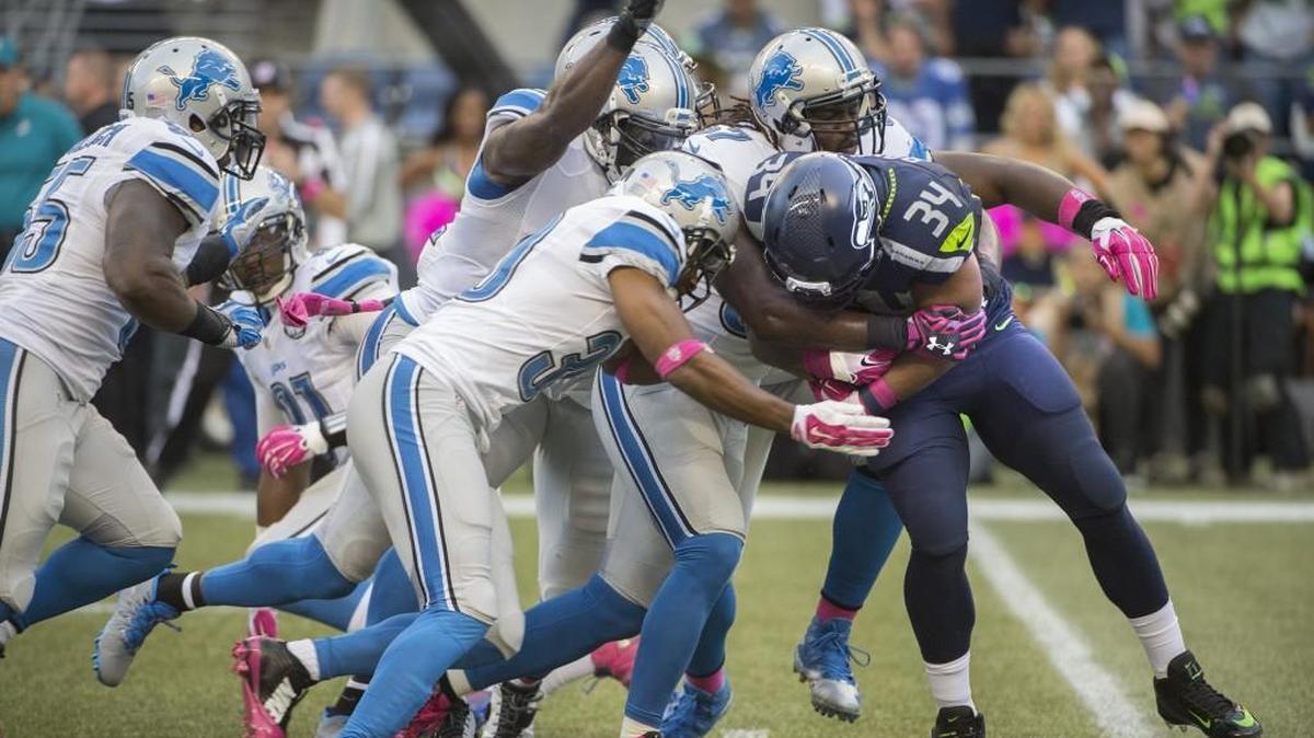 
There wasn’t much running room for Seahawks running back Thomas Rawls (34), who was often engulfed by a multitude of Lions defenders whenever he touched the ball Monday night at CenturyLink Field.
