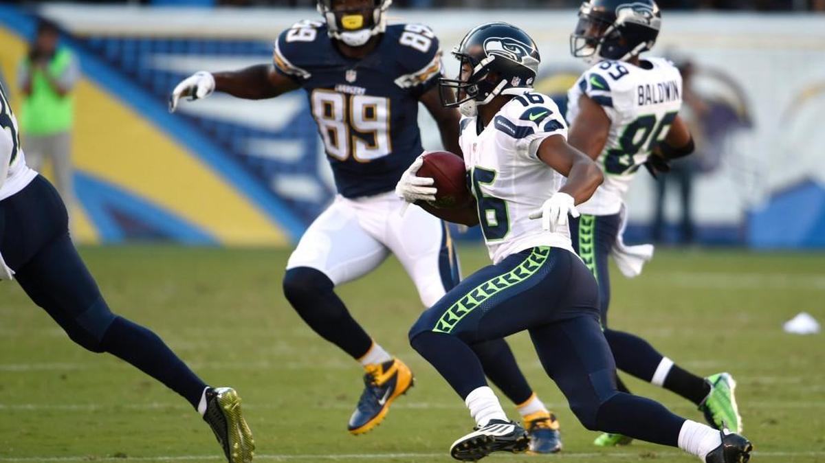 
Watching Seahawks rookie Tyler Lockett, second from right, returns a punt for a touchdown against the San Diego Chargers on Saturday brought back memories for columnist John McGrath of another speedster who came to the NFL via Kansas.
