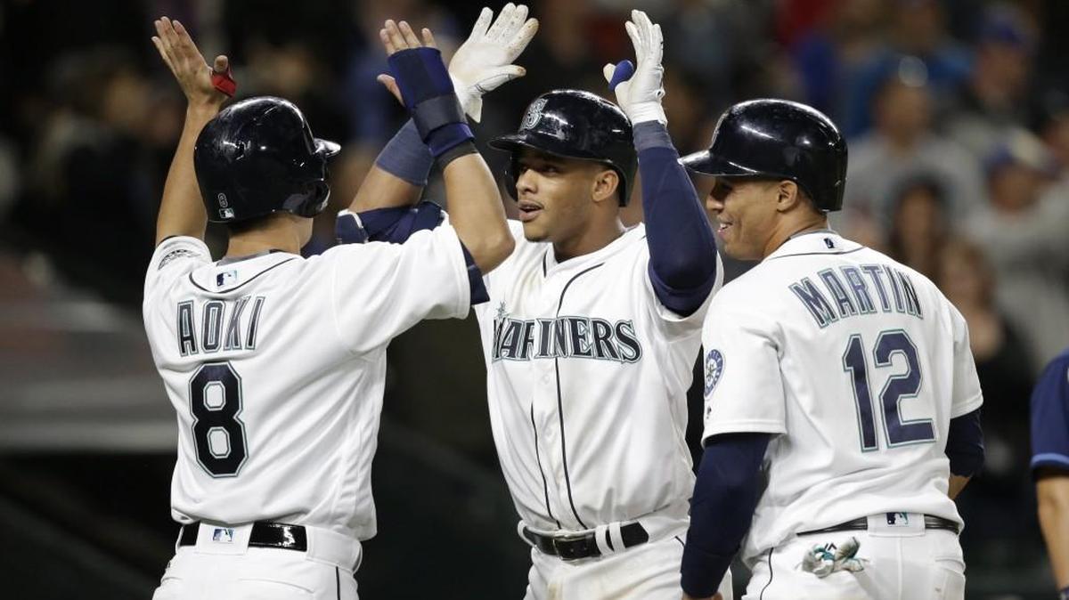 Seattle Mariners Ketel Marte, right, Norichika Aoki (8) and Leonys Martin (12) have played important parts on a team that has surged to the top of the AL West. And up until now, you might not have known any of them.