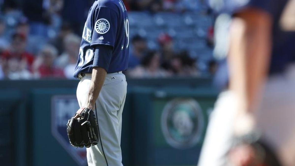 Seattle Mariners relief pitcher Edwin Diaz looks toward home plate after giving up a run in the ninth inning of a baseball game against the Los Angeles Angels, Sunday, April 9, 2017, in Anaheim, Calif. The Angels won 10-9 (AP Photo/Christine Cotter)