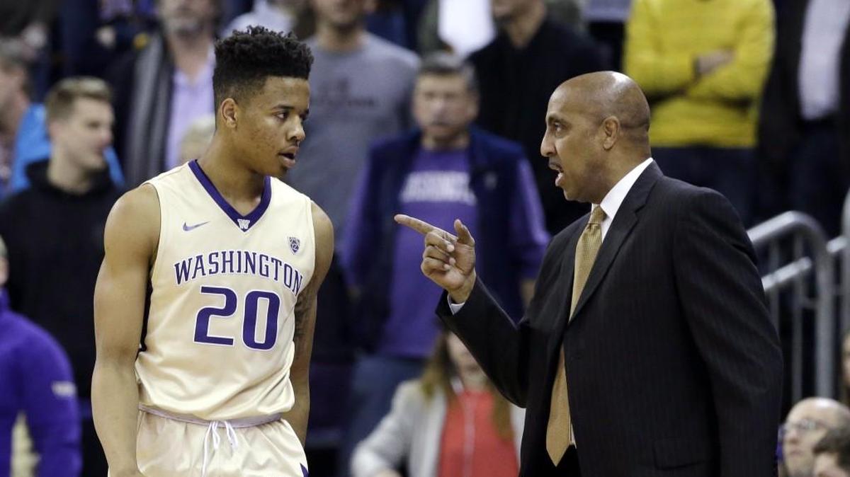 Washington head coach Lorenzo Romar, right, talks with Markelle Fultz during a timeout against UCLA in February. Fultz is predicted to be the No. 1 pick in the NBA Draft while Romar is now an assistant at Arizona.