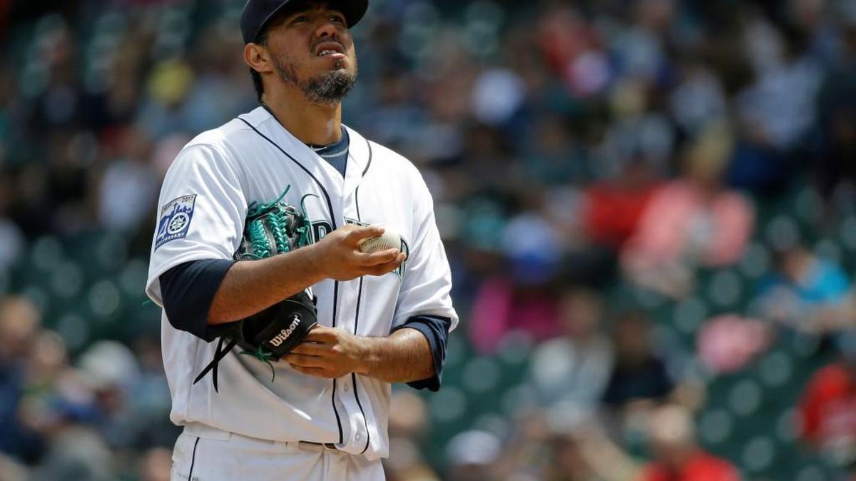 Seattle starting pitcher Yovani Gallardo pauses on the mound during the second inning of the Mariners’ 6-3 loss to the Colorado Rockies, Thursday, June 1, 2017, in Seattle. Colorado scored four runs during the inning.