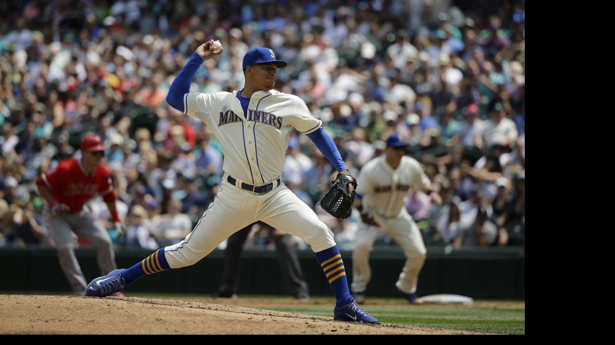 
Young starting pitcher Taijuan Walker is a major chip if Seattle wants to make a trade before the deadlne next week, but the Mariners would be wise to hold onto young talent, writes columnist John McGrath.
