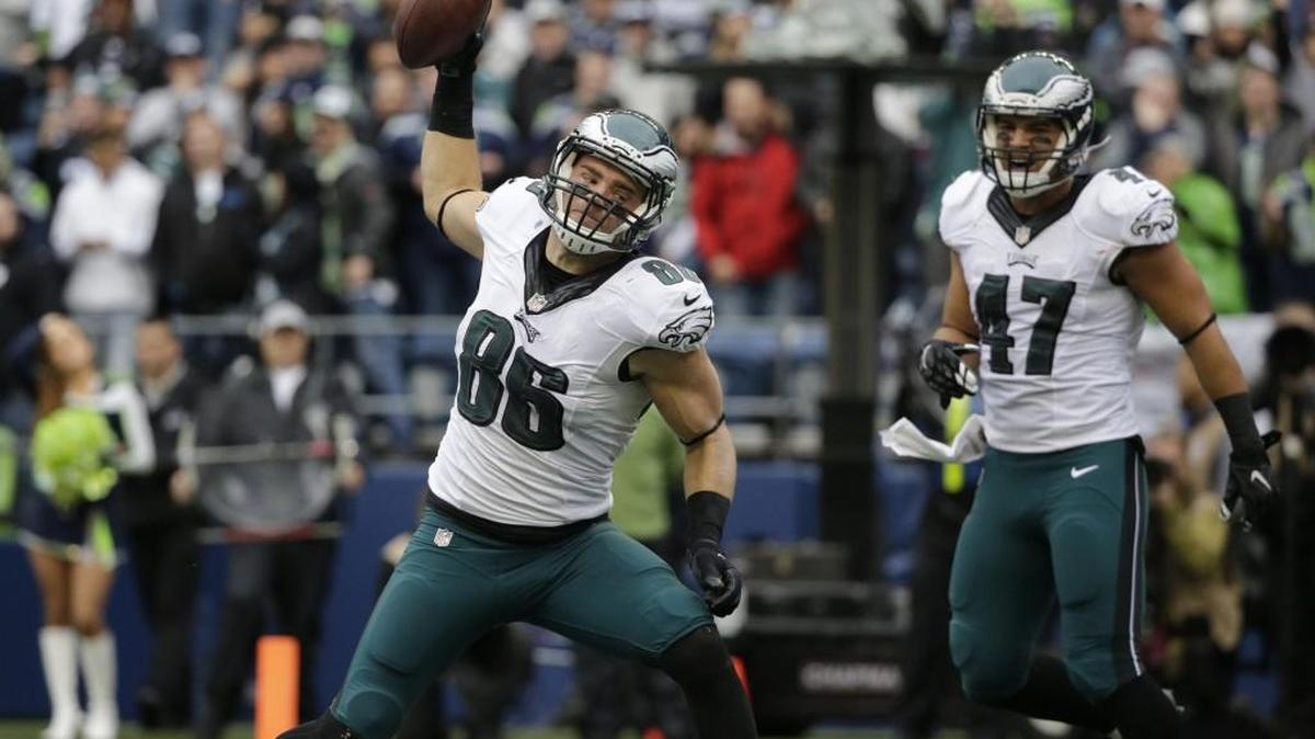 Philadelphia Eagles tight end Zach Ertz spikes the football as tight end Trey Burton (47) looks on after Ertz scored a touchdown. Ertz would have a second touchdown nullified later in the game due to an illegal formation penalty on Nelson Agholor.