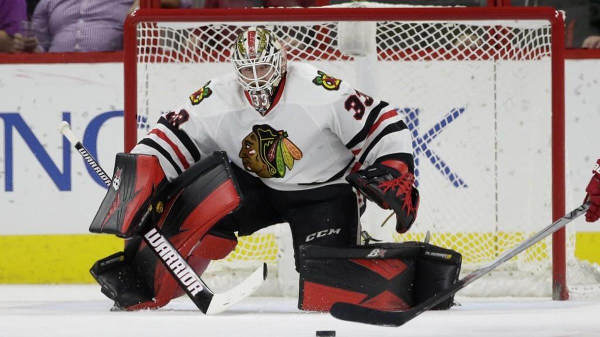 Blackhawks goalie Scott Darling watches the puck during a recent game. Darling, whose dad was stationg at Fort Lewis, spent a lot of time playing at the Sprinker Ice Center in Tacoma as a youngster.