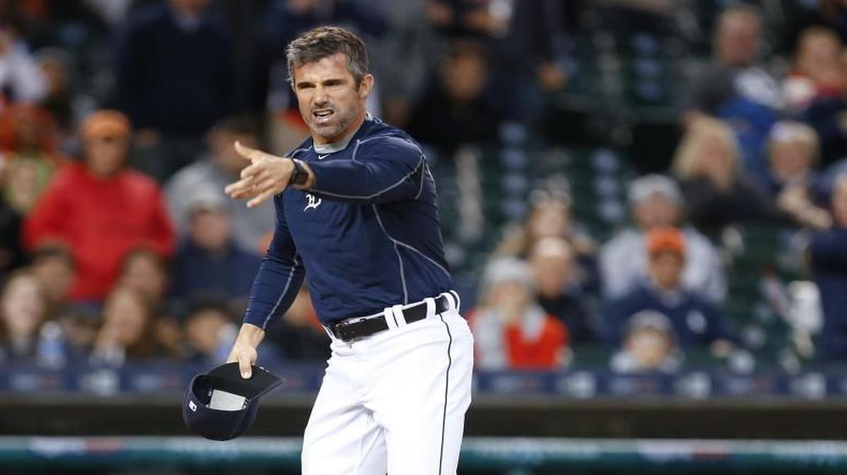 Detroit Tigers manager Brad Ausmus yells at home plate umpire Doug Eddings after laying his sweatshirt on home plate against the Minnesota Twins in the fourth inning Monday in Detroit. Ausmus was thrown out of the game.
