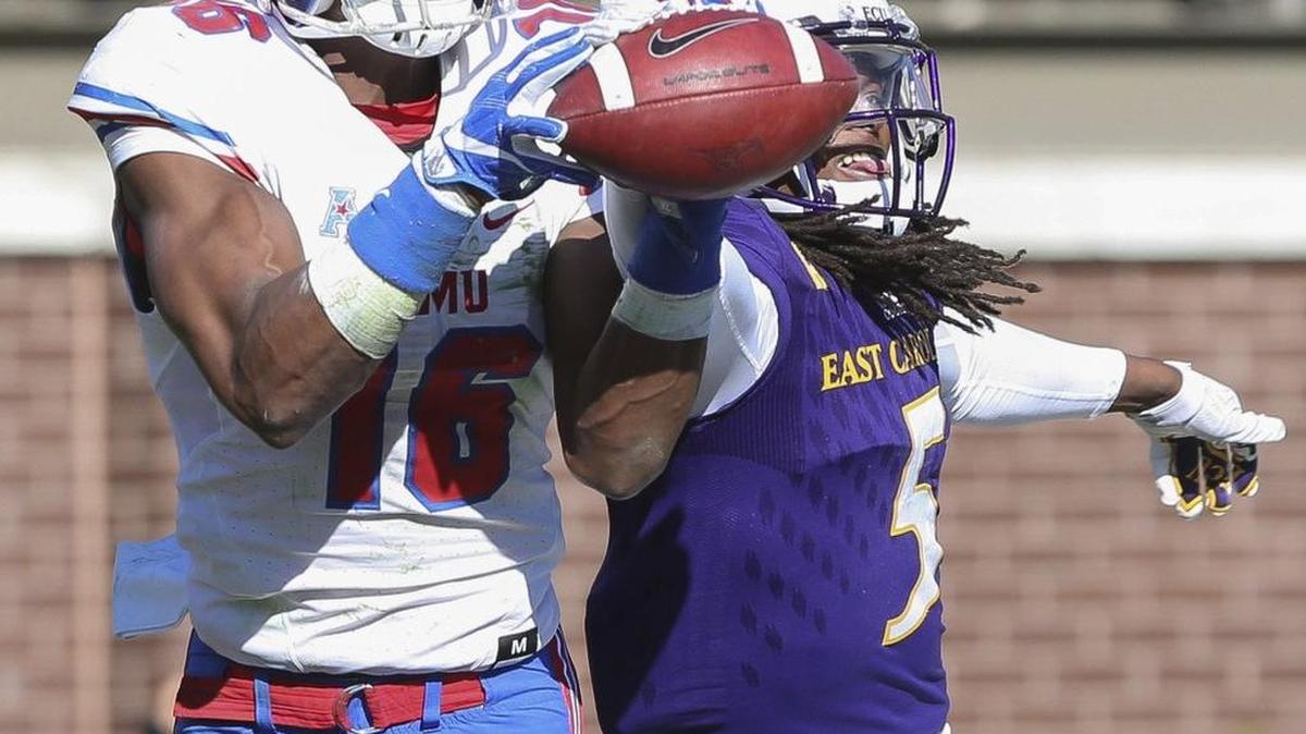 Could the Seahawks be looking at SMU wide receiver Courtland Sutton, shown here catching a touchdown pass in front of East Carolina’s Corey Seargent, for the 2018 NFL draft?