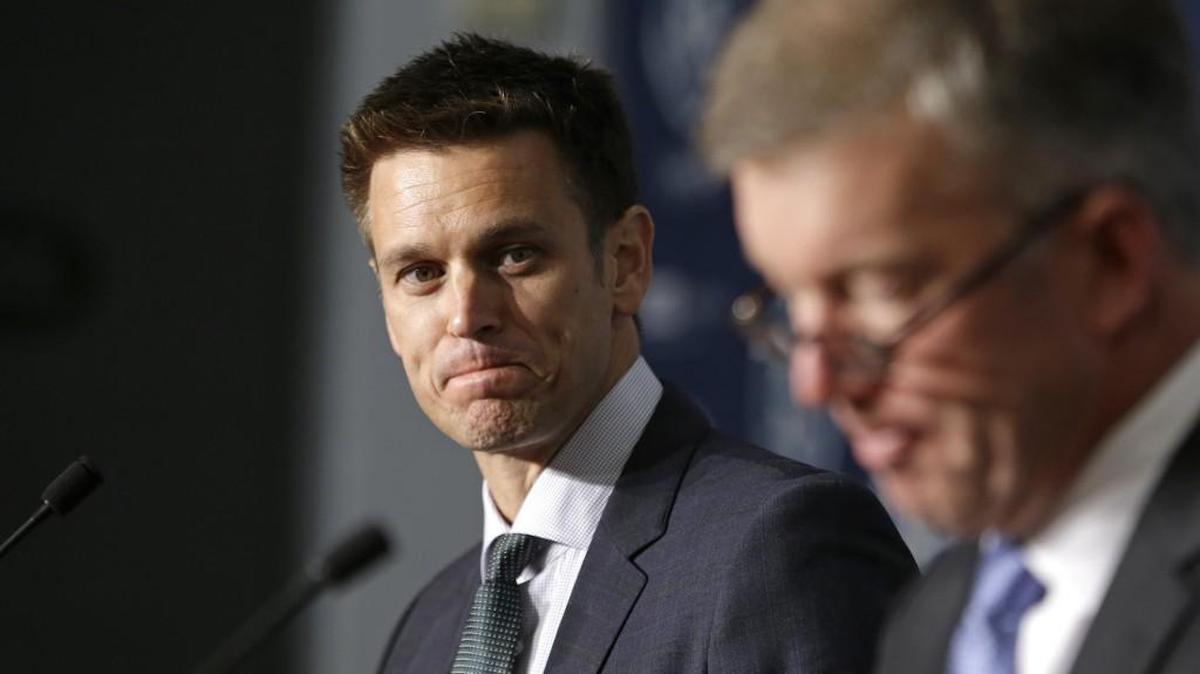 
New Seattle Mariners general manager Jerry Dipoto, left, looks on as team president Kevin Mather speaks at a news conference Tuesday.
