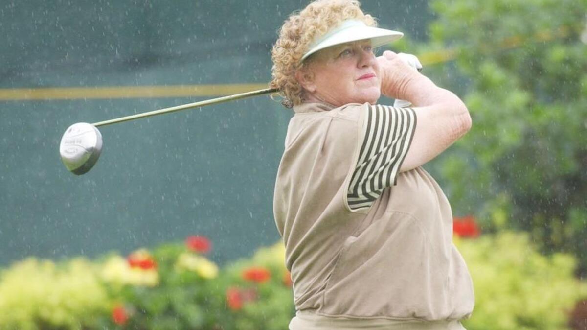 LPGA golfer JoAnne Carner tees off on the 10th hole during the final round of the Chick-fil-A Charity Championship May 2, 2004 in Stockbridge, Ga.. Carner, 65, was the oldest player to make a cut on the LPGA Tour.