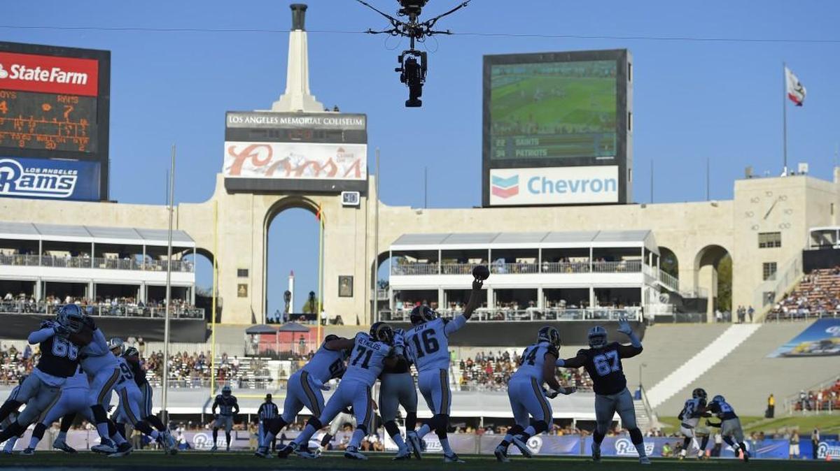 Los Angeles Rams quarterback Jared Goff (16) passes against the Dallas Cowboys in the first half of a preseason NFL football game at Los Angeles Memorial Coliseum, Saturday, Aug. 13, 2016, in Los Angeles.