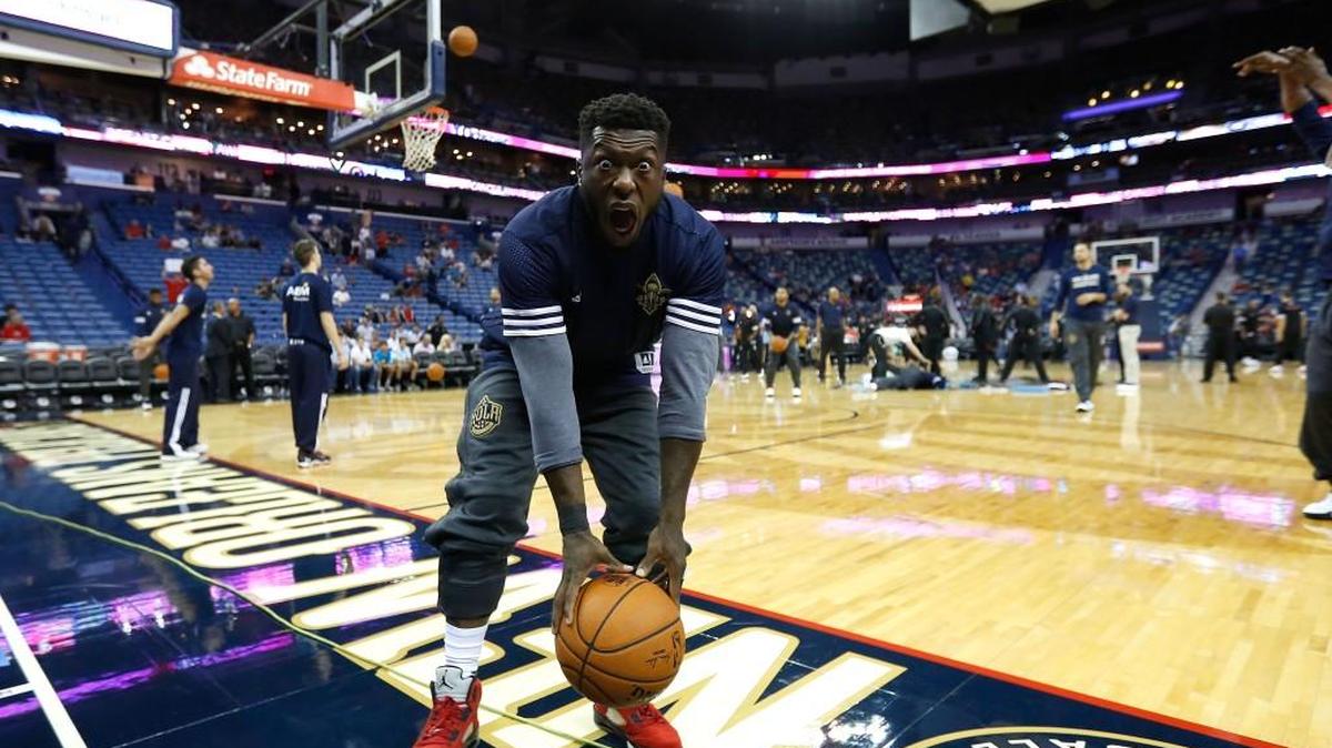 New Orleans Pelicans guard Nate Robinson (2) mugs for the camera before an NBA preseason game in New Orleans in 2015. Robinson, a former two-sport star, is hoping for a tryout with an NFL team.
