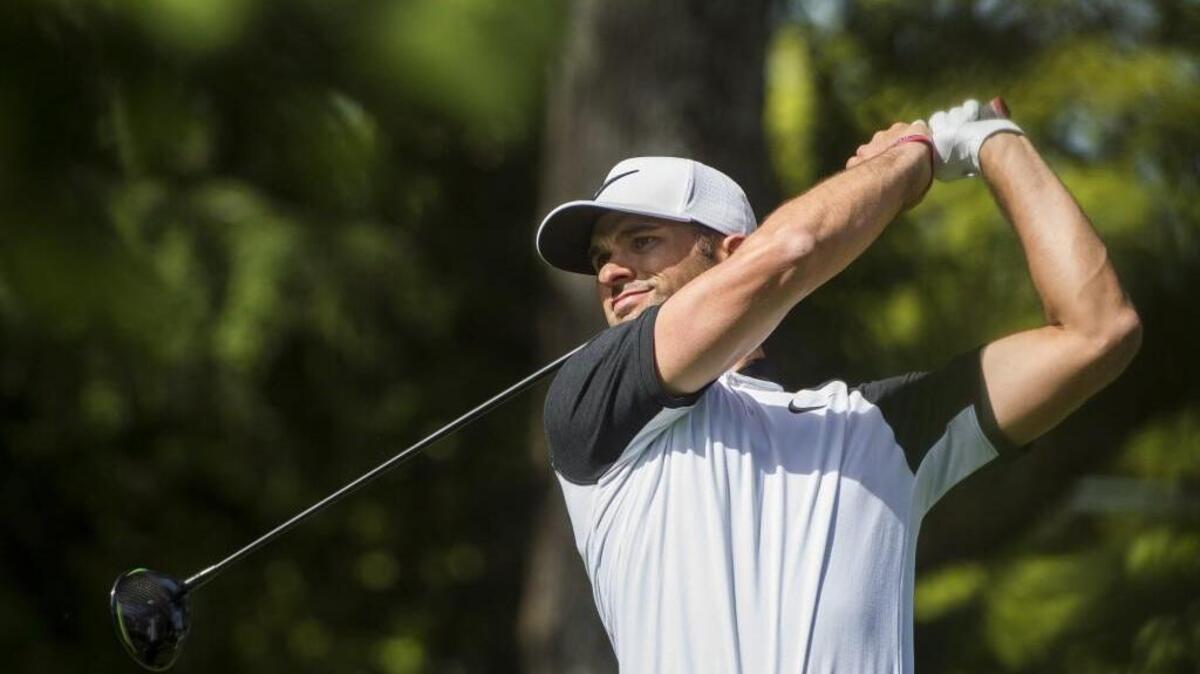 Derek Barron watches his drive Monday after teeing off the 11th hole of the US Open sectional qualifier at theTacoma Country and Golf Club in Lakewood.