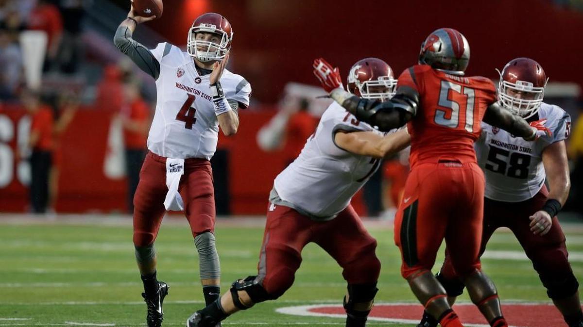 
Washington State quarterback Luke Falk (4) was honored as the Pac-12 Conference offensive player of the week after throwing for 478 yards and four touchdowns and leading a late comeback against Rutgers on Saturday.
